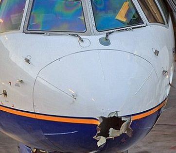 Lightning Strike Leaves Hole in Nose of Plane, Flight Continues 8 Hours  Anyway! - View from the Wing