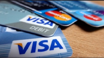 visa and mastercard cards spread out