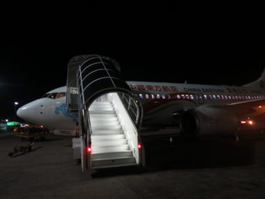 stairs going to plane on tarmac