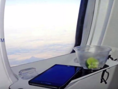 airplane window with tray