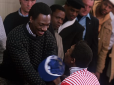 eddie murphy shaking hand