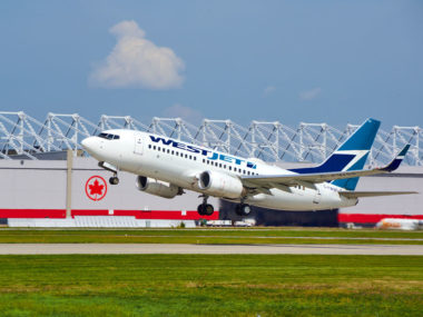 westjet plane taking off