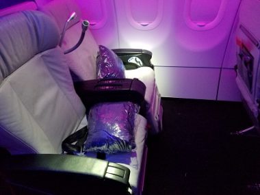 airline cabin with purple lights