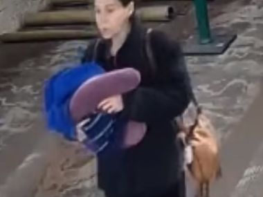 woman walking through airport