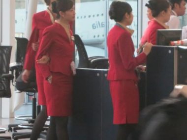 flight attendants boarding plane
