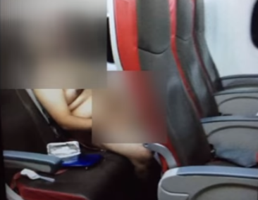 man masturbating on plane