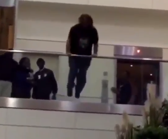 man jumping over ledge