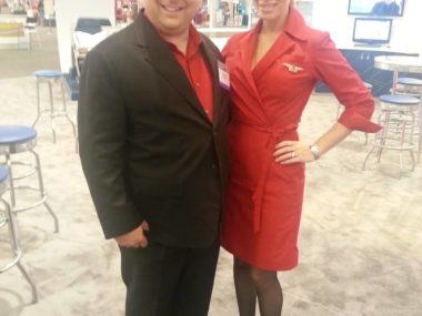 gary standing next to a flight attendant