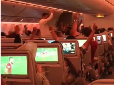 people cheering on flight