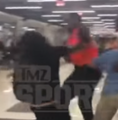 people fighting in airport
