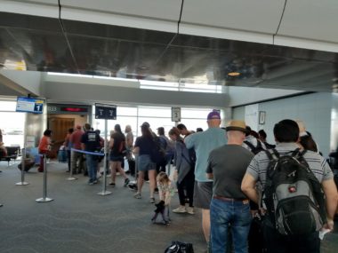 people in line at airport