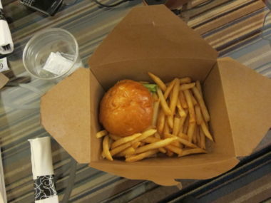 hamburger and fries in box