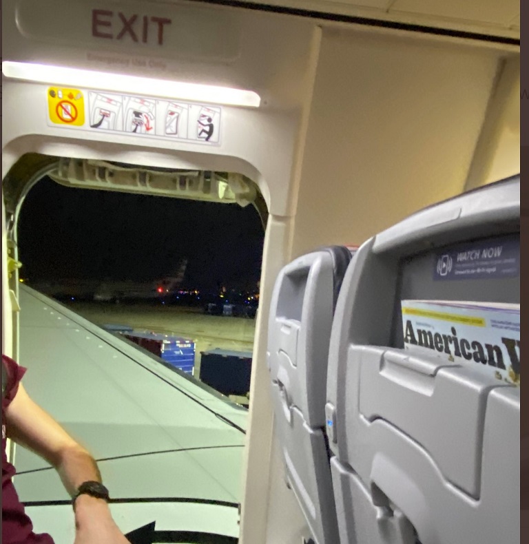 Passenger Can't Take American Airlines Delay Anymore, Opens Exit Door And Pops T..