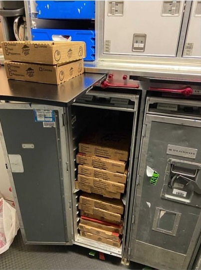 American Catered An Entire Flight With Pizza Hut Pizzas From Inside The Airport