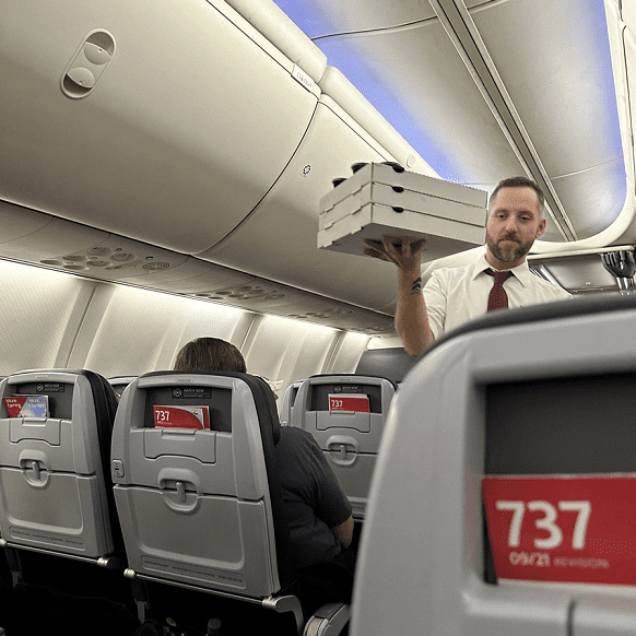 Nobody Minded A Six Hour Delay When This American Airlines Pilot Threw A Pizza P..