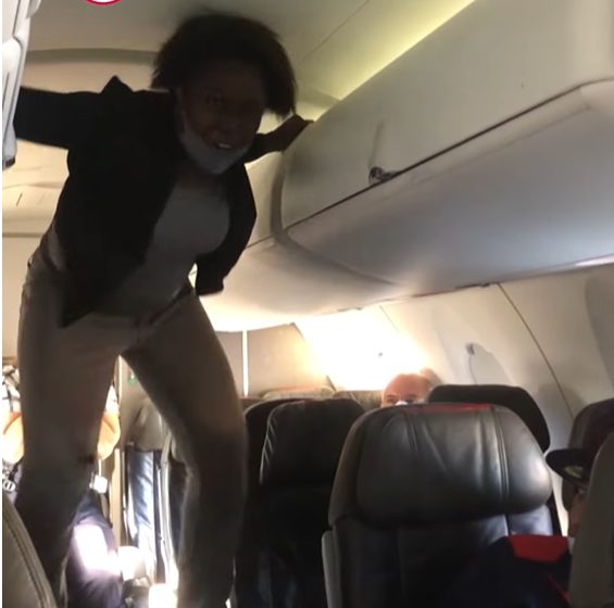 American Airlines Passenger Emerges From Lavatory, Climbs Through Aisle [Roundup]