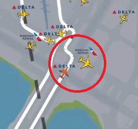 Near disaster when American Airlines plane passes in front of departing Delta Jet in New York