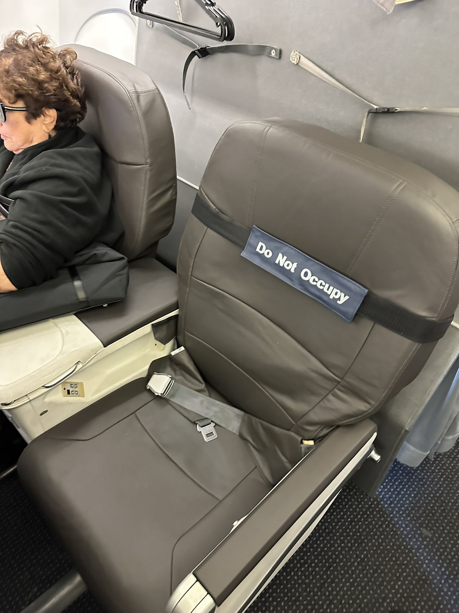 Passengers Miss Upgrades When American Airlines Doesn't Bother Fixing