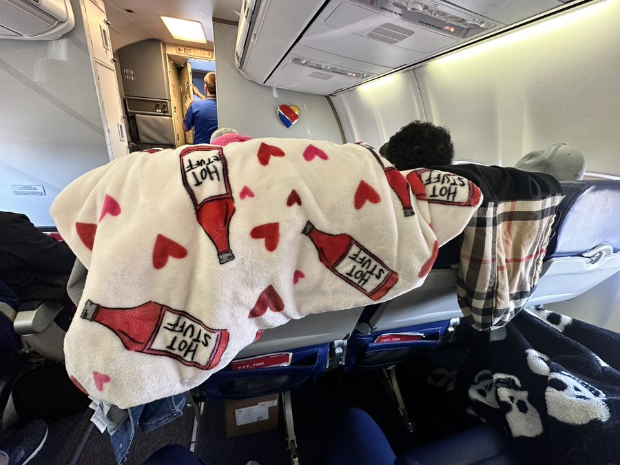MidAir Etiquette Fail Southwest Passenger's 'Hot Stuff' Blanket Blocks Tray Table View from