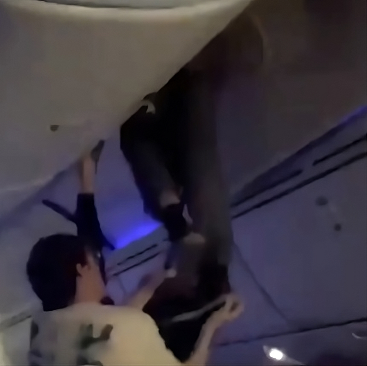 Unbelievable Video: Passenger Lodged in Overhead Bin During Terrifying Transatlantic Turbulence