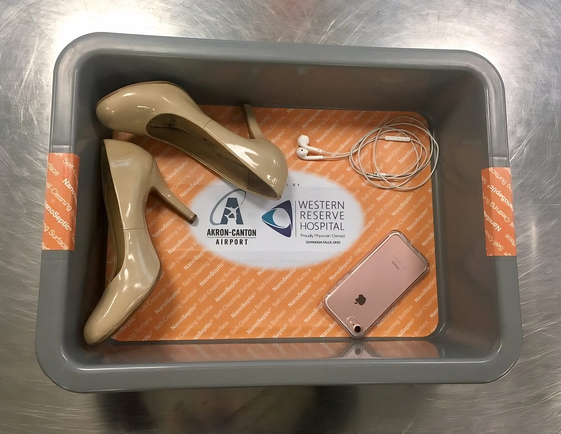 The Viral ‘Airport Tray Aesthetic’ Trend: Gen Z Turns TSA Bins Into Fashion Statements (It’s Driving Travelers Crazy)