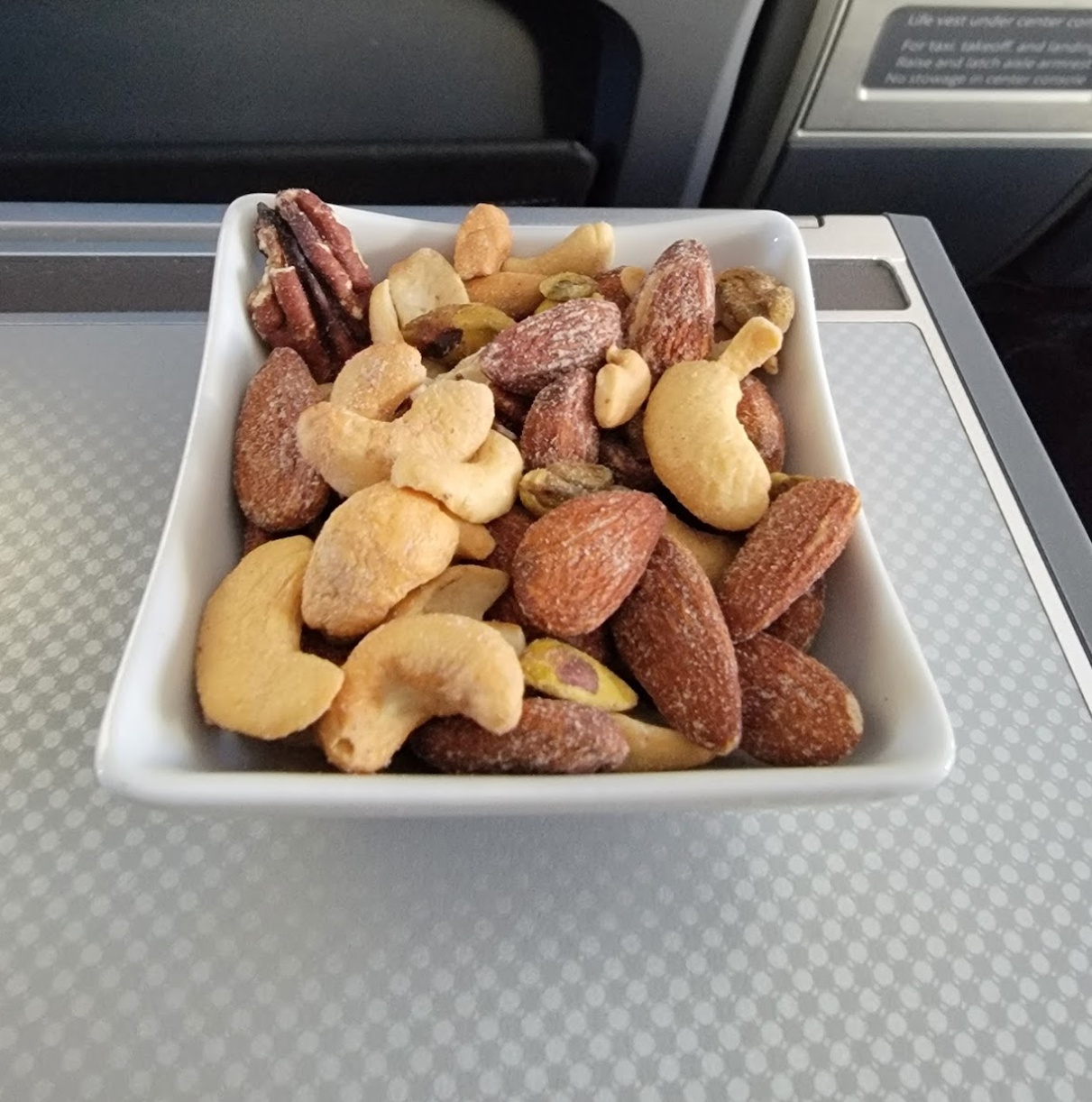 TravelWireDaily — First Class Hot Nuts Feel Stale — It’s Time For Airlines To Serve Something Better