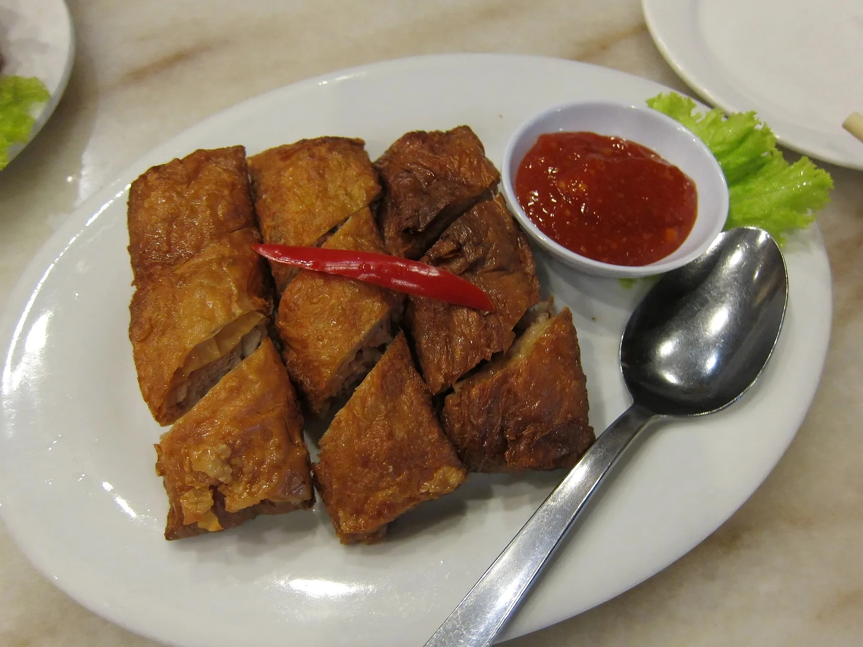 Airline Greenwashing Is Literally Causing Deforestation—By Paying Restaurants Not To Fry With Their Cooking Oil