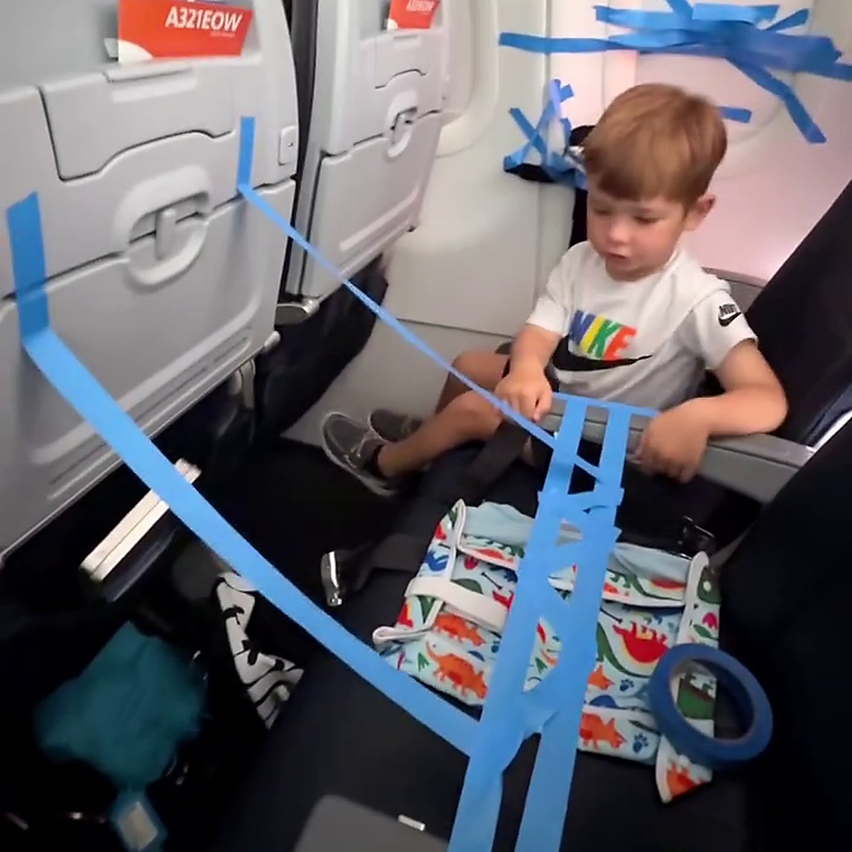 viewfromthewing.com - Gary Leff - American Airlines Passenger's 'Painter's Tape Hack' to Entertain Toddler Sparks Outrage-Selfish Or Brilliant?