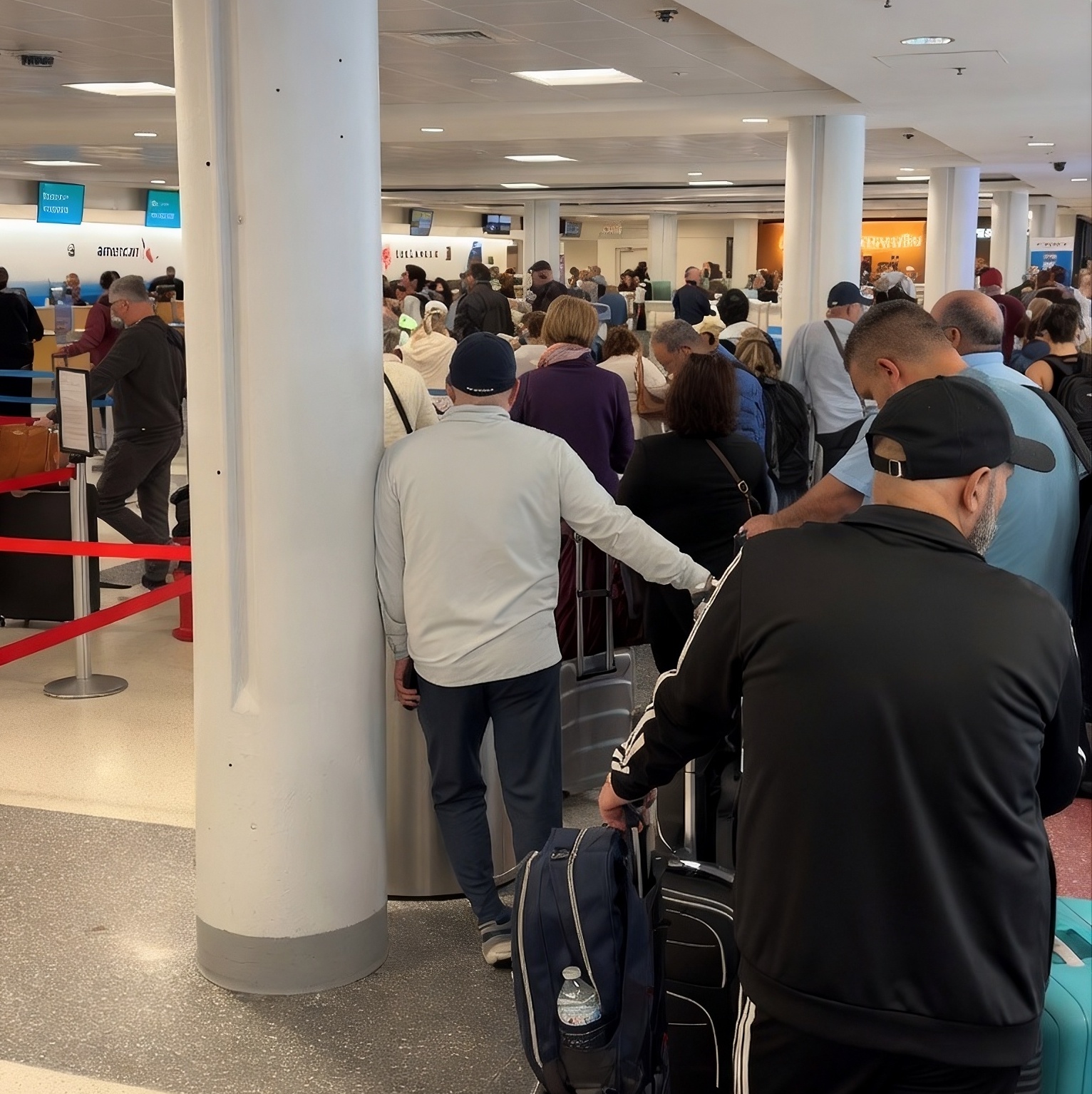 TravelWireDaily — Why Are Airlines Still Making You Stand In Line For An Hour To Drop A Bag You Tagged Yourself?