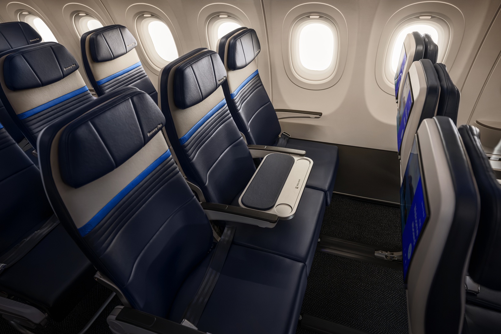 TravelWireDaily — United Turns Coach Middle Seats Into Tables—Selling Extra Elbow Room And Staffing Fewer Flight Attendants